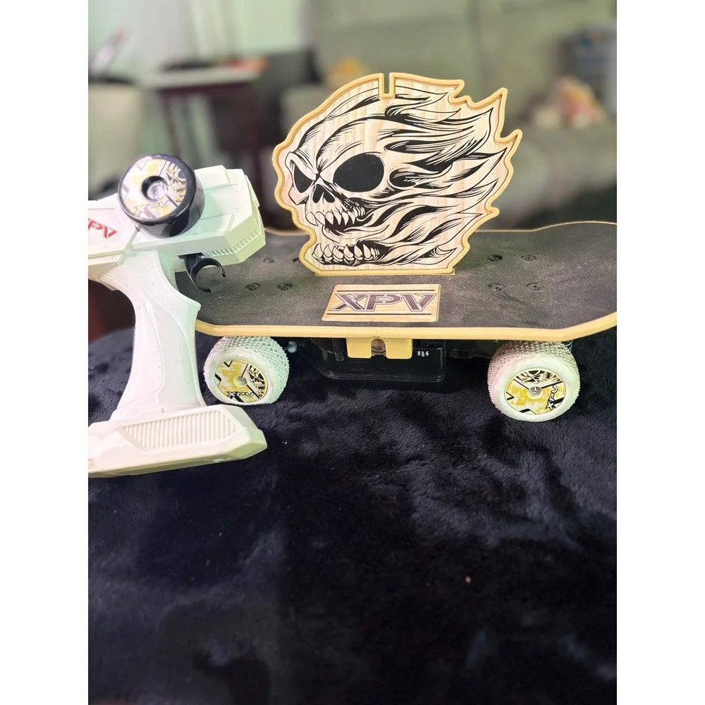 XPV Remote Control Skateboard Flaming Skull Graphic RC Toy with Remote White